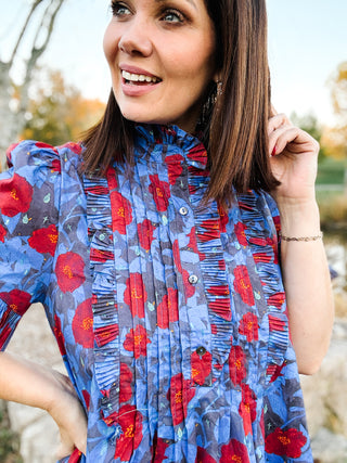 The Sabina Dress – Blue Floral High Neck Mini Dress with Ruffles and Pleating