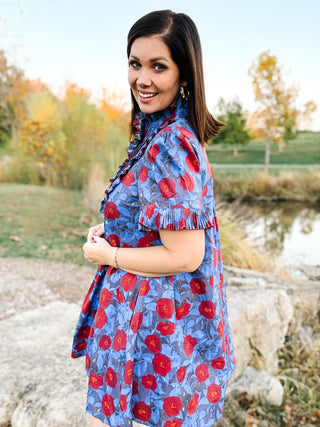 The Sabina Dress – Blue Floral High Neck Mini Dress with Ruffles and Pleating