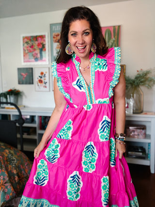 hot pink floral midi dress with ruffle sleeves and embroidered neckline