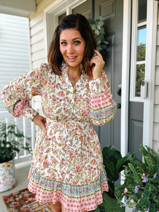 Ivory floral long sleeve mini dress with belted waist and contrast trim