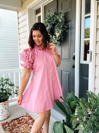 Karlie pink poplin mini dress with pleated puff sleeves, ruffle neckline and adjustable back tie