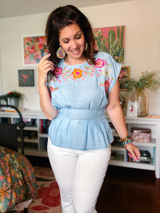light blue embroidered peplum top with colorful floral embroidery by THML