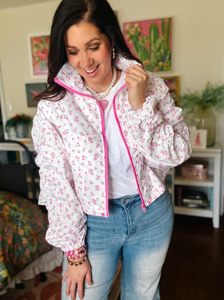 lightweight floral zip-up jacket with pink trim and puff sleeves