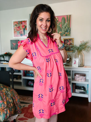 bright coral pink embroidered mini dress with flutter sleeves and floral embroidery