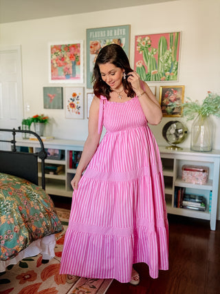 pink striped smocked maxi dress with tie shoulder straps and tiered skirt