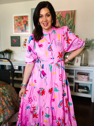 pink tropical print midi dress with puff sleeves and button detail