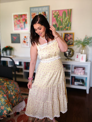 yellow floral eyelet lace two piece skirt set with tie strap crop top and midi skirt